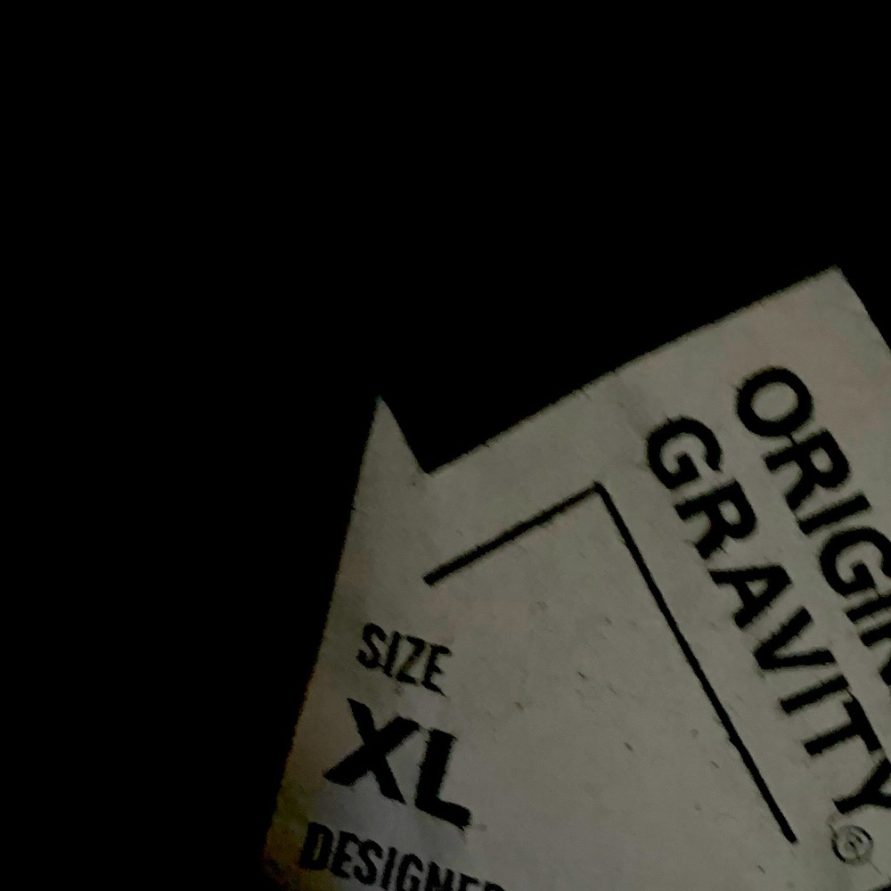 Black and white XL Original Gravity shirt. Very stylish and new quality.